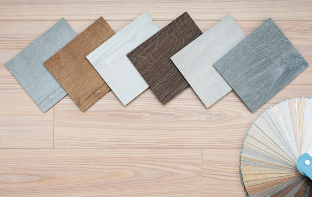 Comparing Flooring Options Luxury Vinyl Plank, Solid Hardwood, and